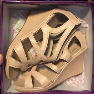 Size 6.5 beige wedges. Worn once. Great condition
